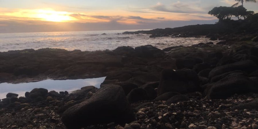 The sun setting in Kona